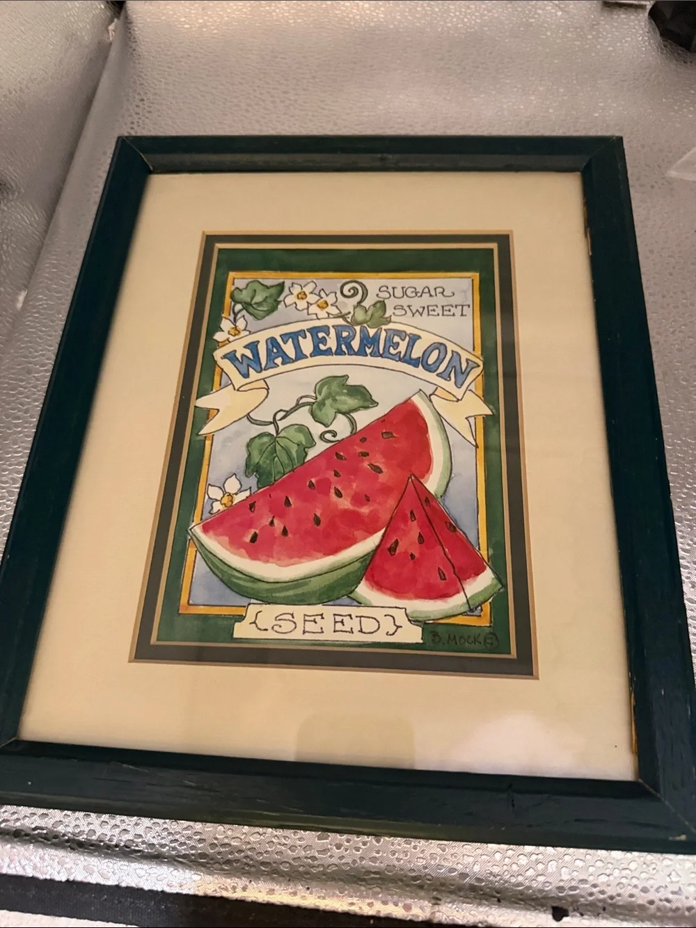 “Large Watermelon Seed Packet” framed picture of a watermelon seed packet.